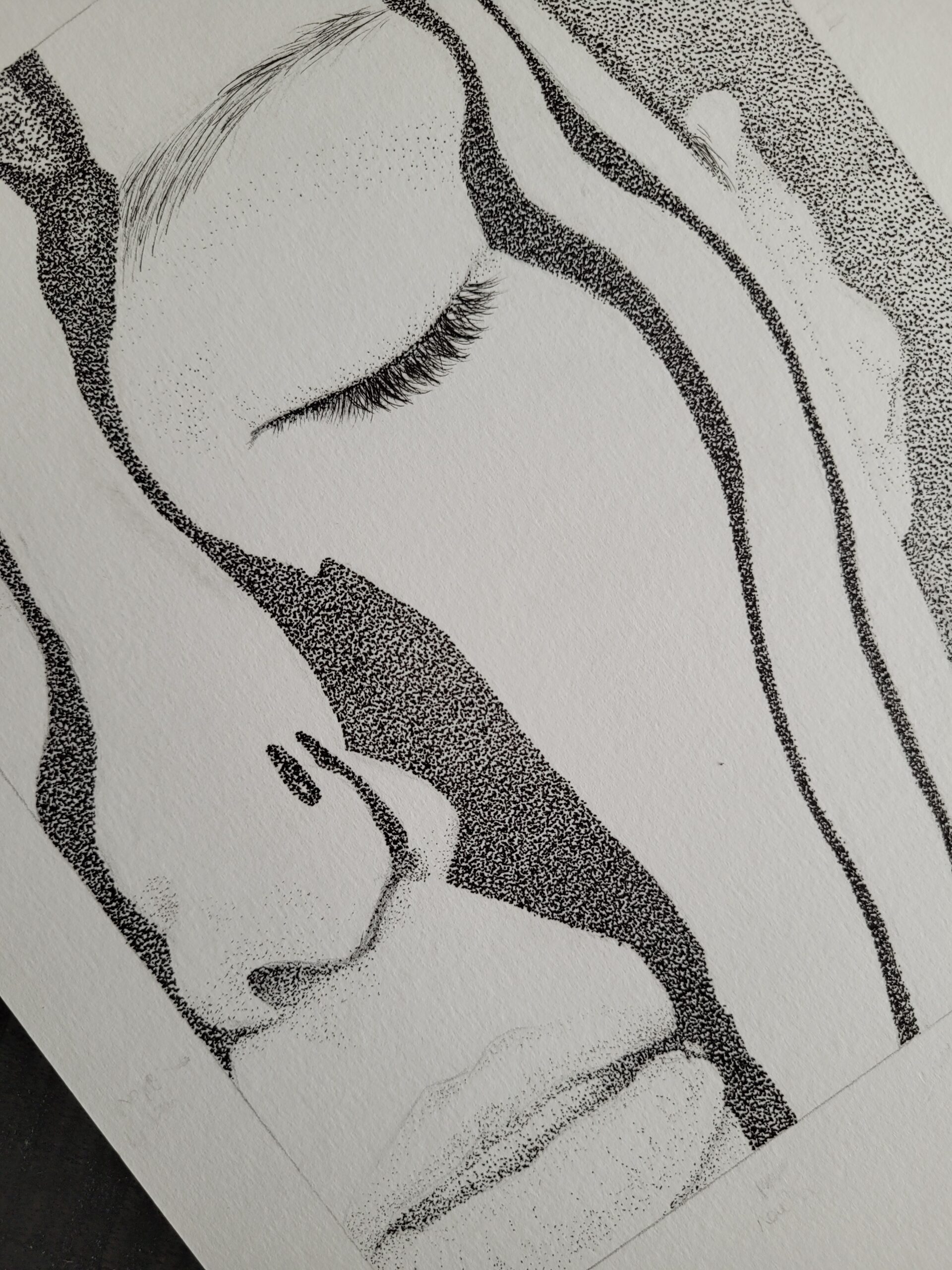 Face with black liquid close up stippling